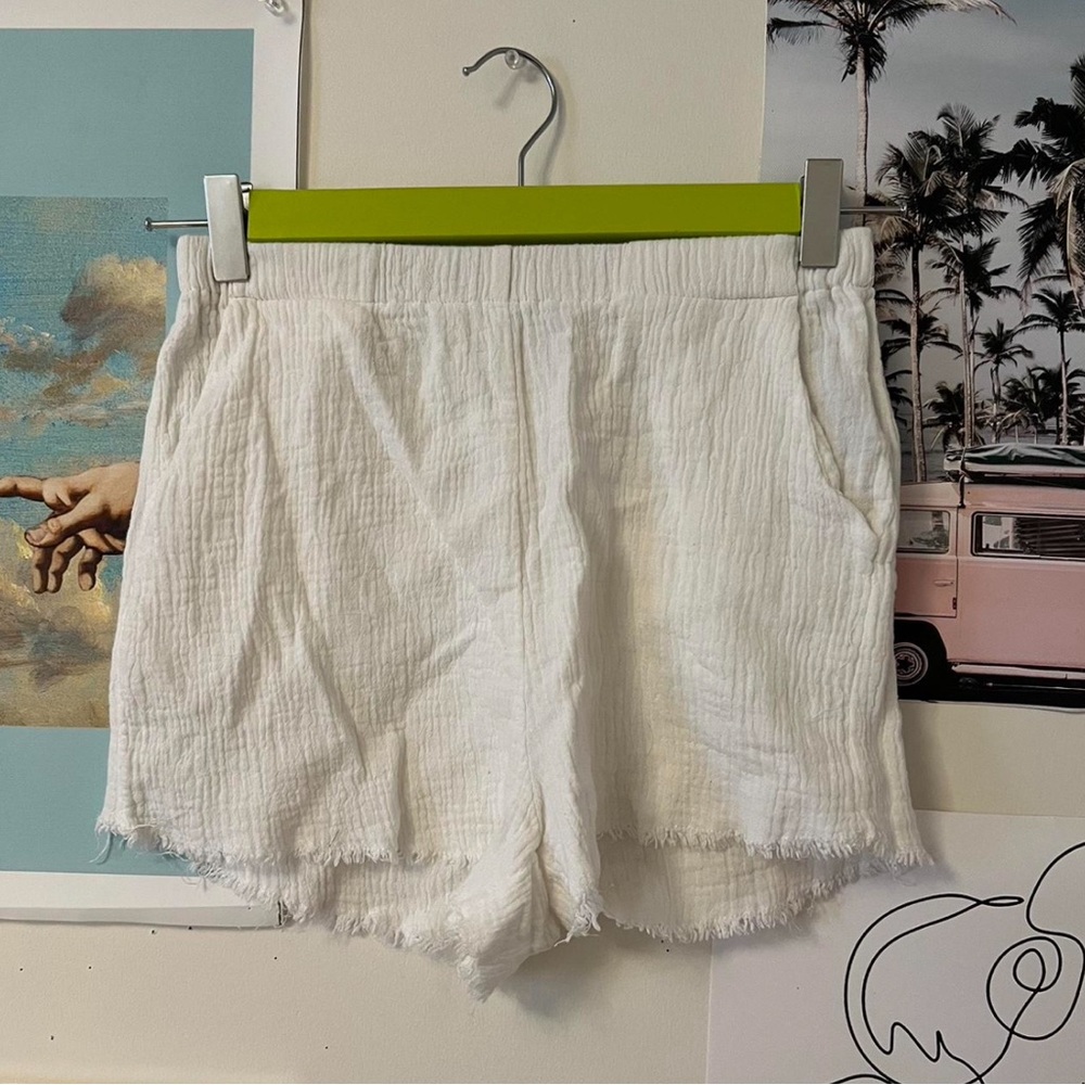 Adika: white linen shorts